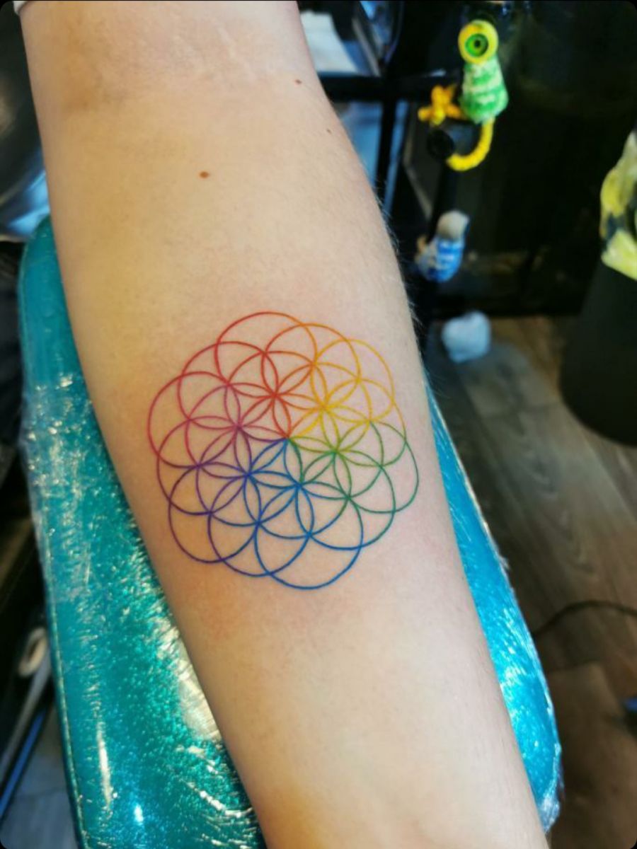 Coldplay flower of life tattoo